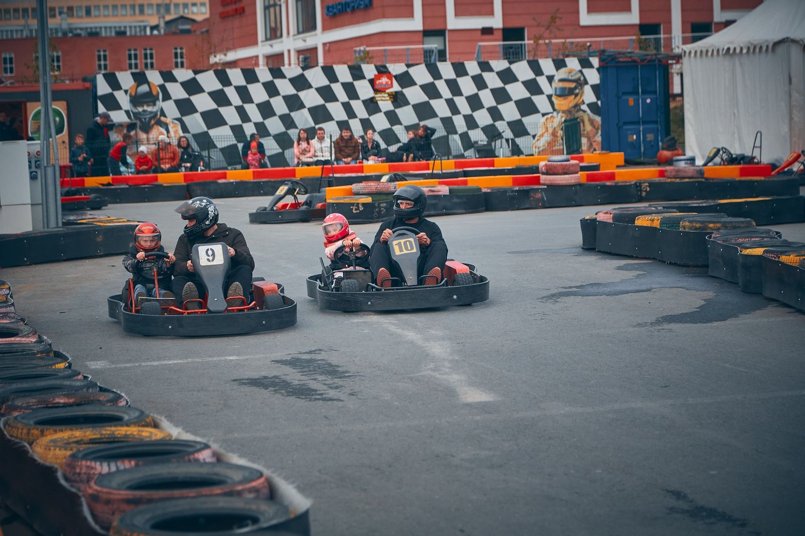 Go-karts racing wheel to wheel on an outdoor track near Newcastle in the Hunter region, New South Wales